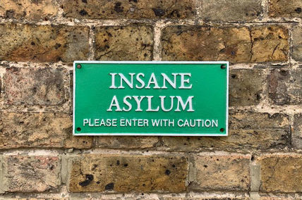 green insane asylum plaque